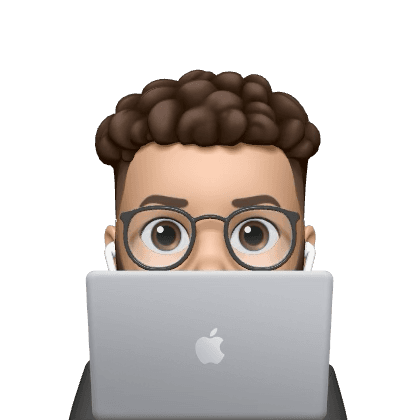 Person peeking from behind laptop
